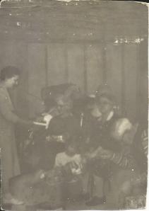 Our second Christmas. L-R Mom, Great-Aunt Mary, me, Grandma, Grandpa